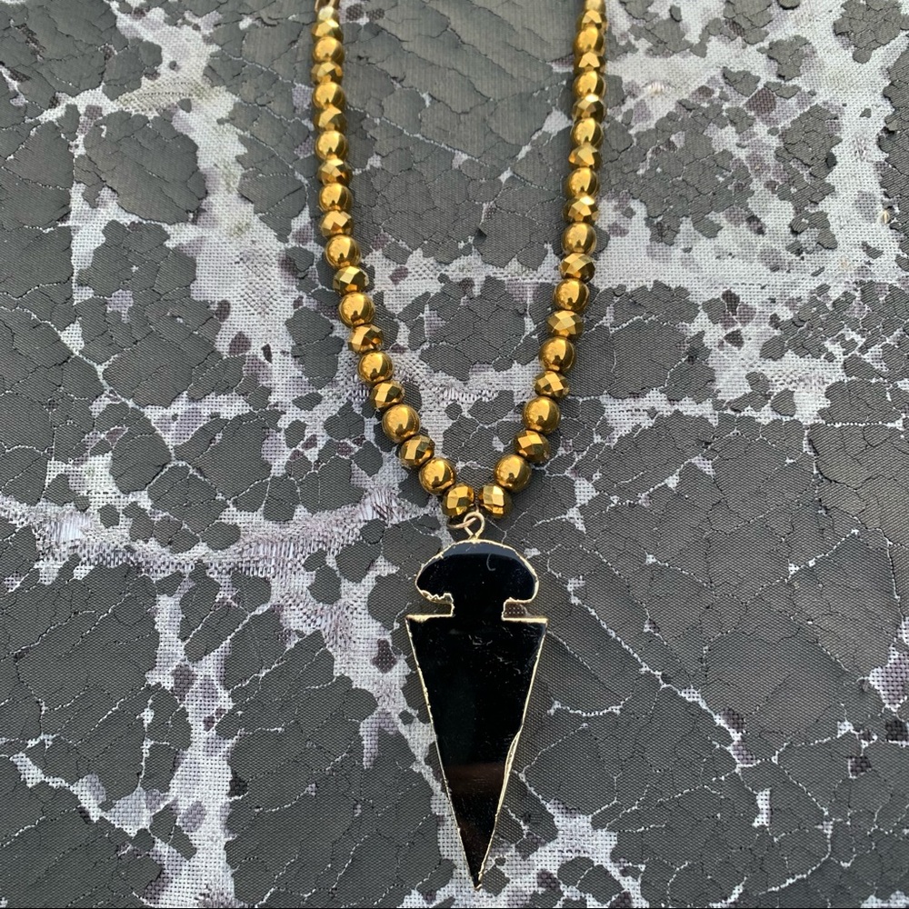 Black and gold stone arrowhead necklace